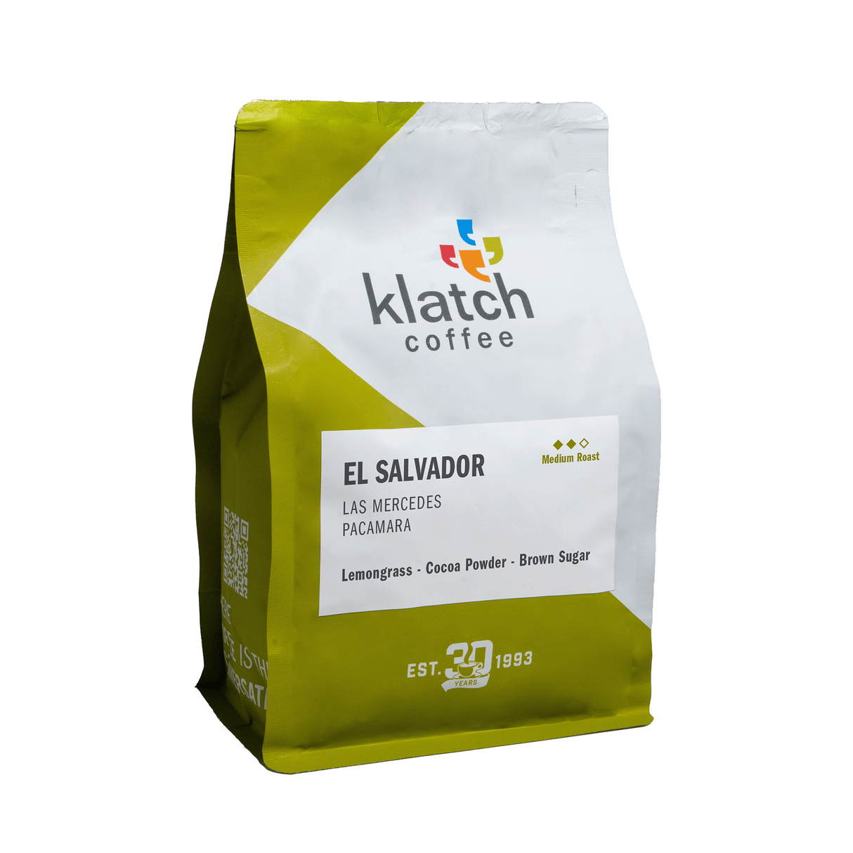 Klatch Coffee El Salvador Las Mercedes Pacamara coffee in green and white coffee bag with white background.