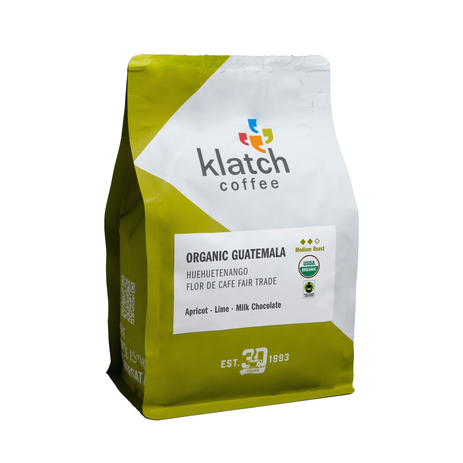 Klatch Coffee Organic Guatemala Huehuetenango Flor De Cafe Fair Trade bag with green and white design on a white background.
